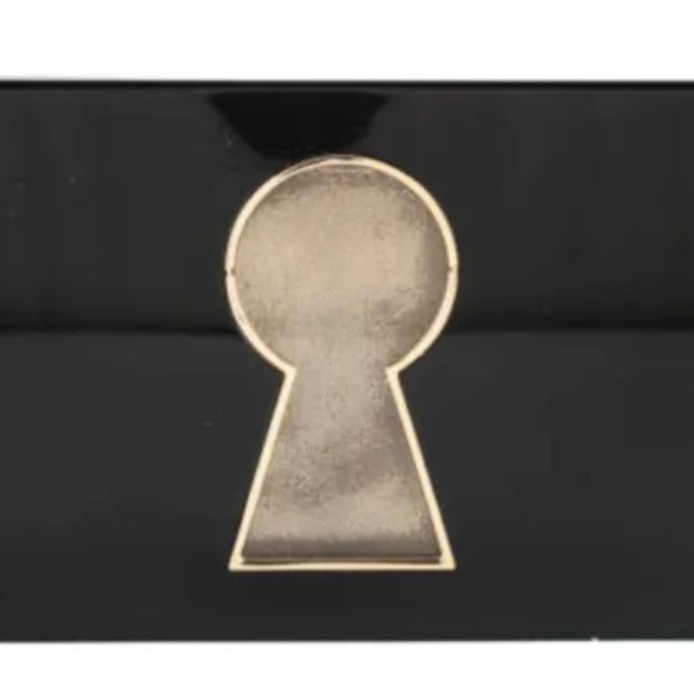 Charlotte Olympia “Eye Can See You” Pandora Clutch